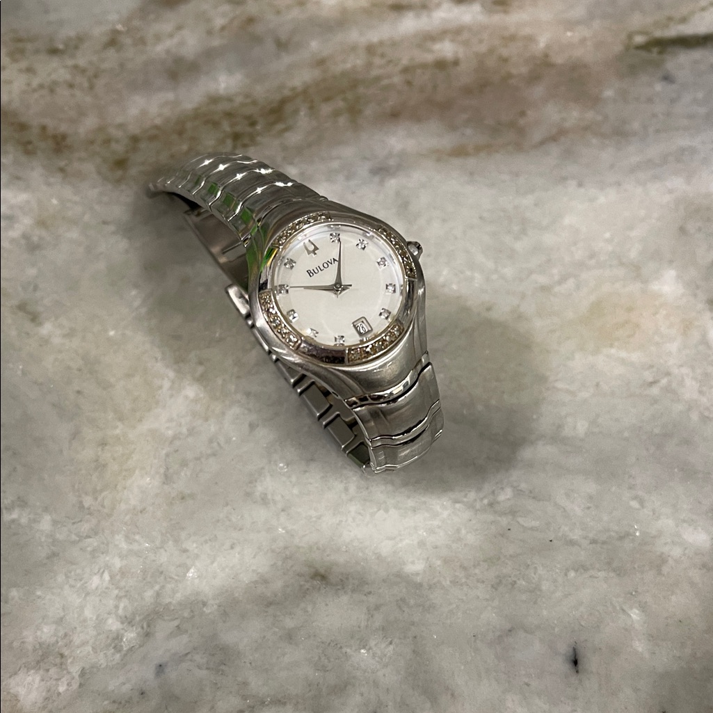Bulova Silver Timepiece With Crystal Details Bulova Silver Timepiece With Crystal Details